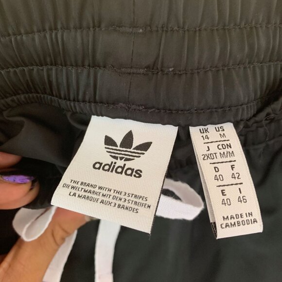 2/$40 adidas Asymetrical skirt with pockets and Silver embroidered Tri-foil logo - Picture 4 of 11